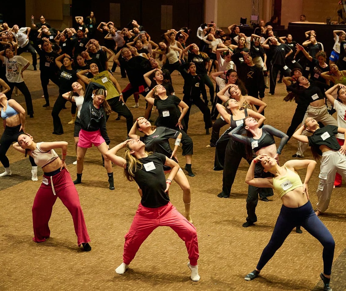 Dancers training together in class